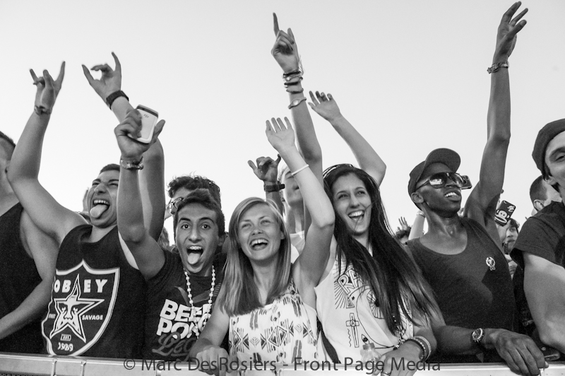 Fans cheer as DJ Tiesto performs on the Main Stage of Ottawa Bluesfest on July 4th, 2012