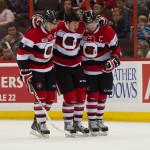 Erik Bradford from the Ottawa 67s is escorted off the ice after hitting the boards hard. Bradford's season comes to a halt due to a fractured femur.